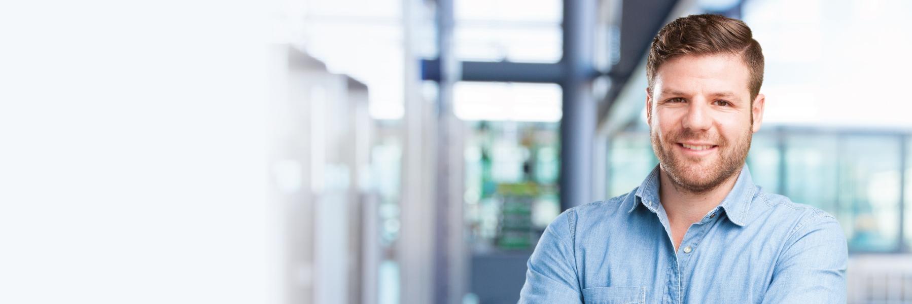 man smiling after using invisalign from modern american dentistry