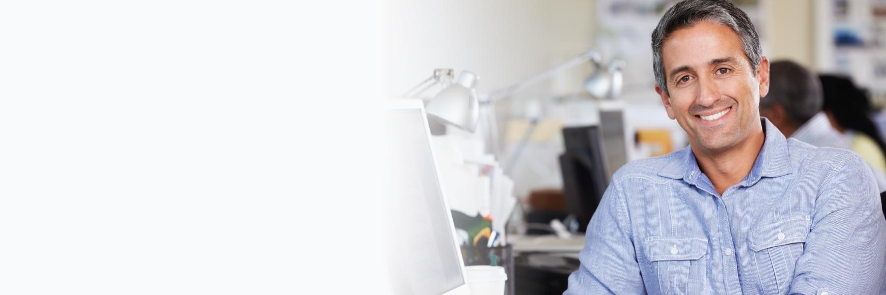 man smiling in woodland hills office 