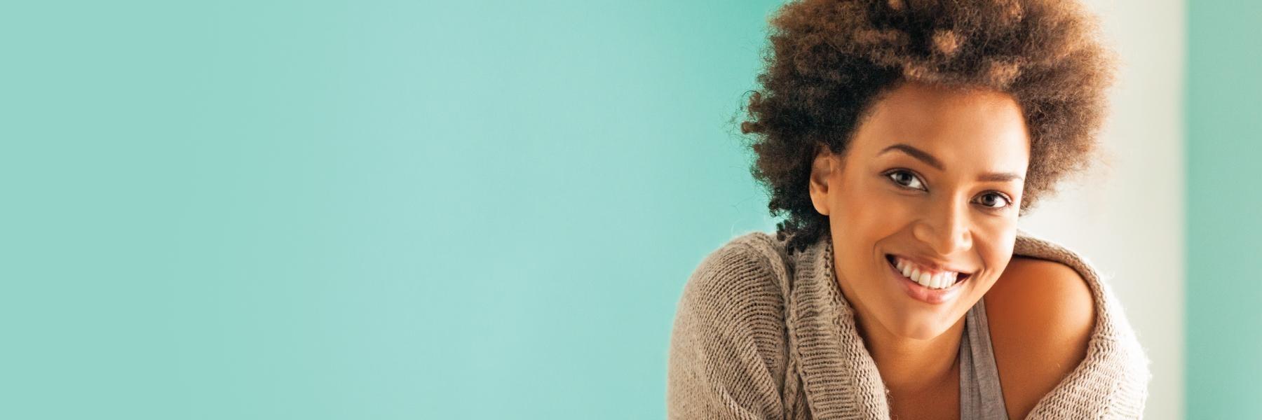 woman smiling after getting mouthguard in Woodland hills